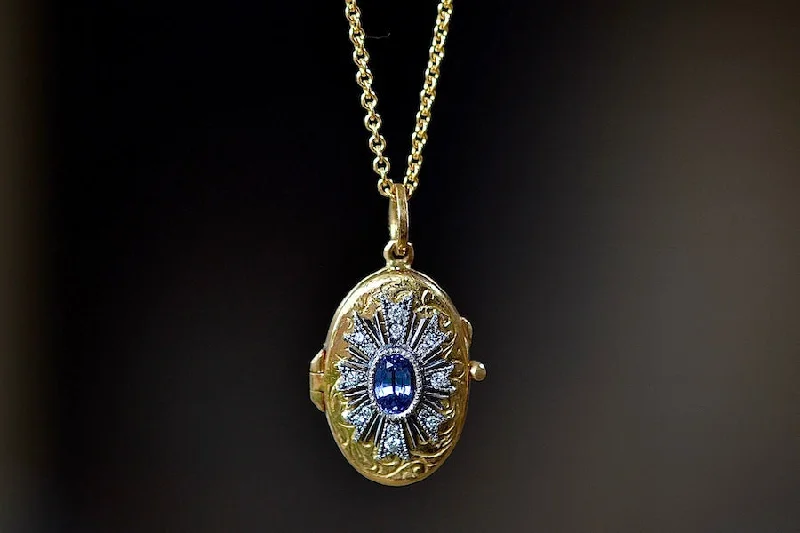 Necklaces and pendants with abstract shapes for a modern, creative appearance-Oval Blue Sapphire Locket