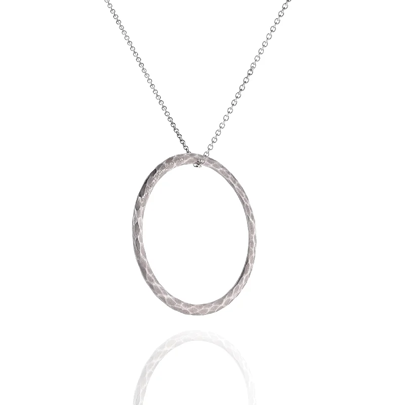 Best necklaces and pendants with opal and gold for a vibrant, luxurious contrast-Estate Paloma Picasso Tiffany & Co Sterling Silver Hammered Circle Pendant Necklace